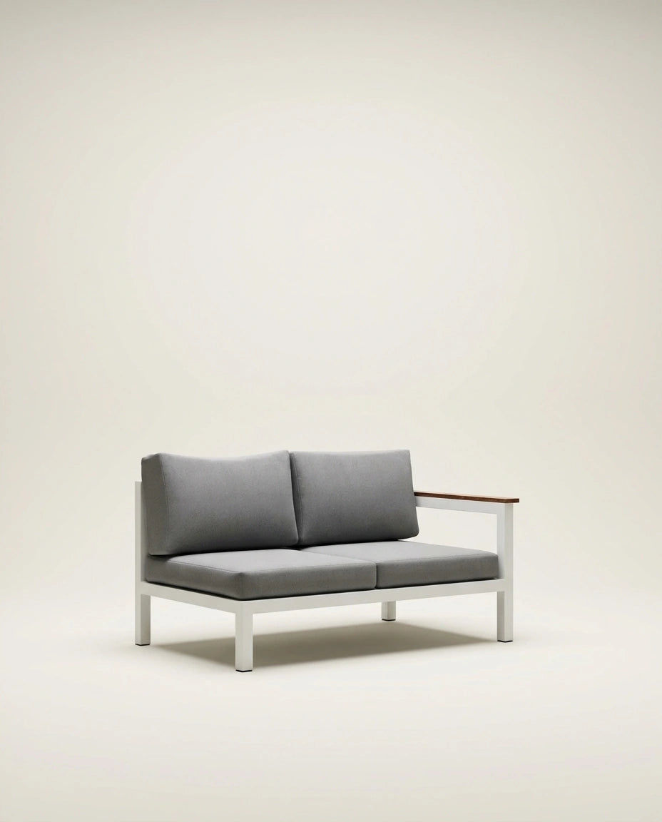 Gray sofa with wooden armrest on a beige background