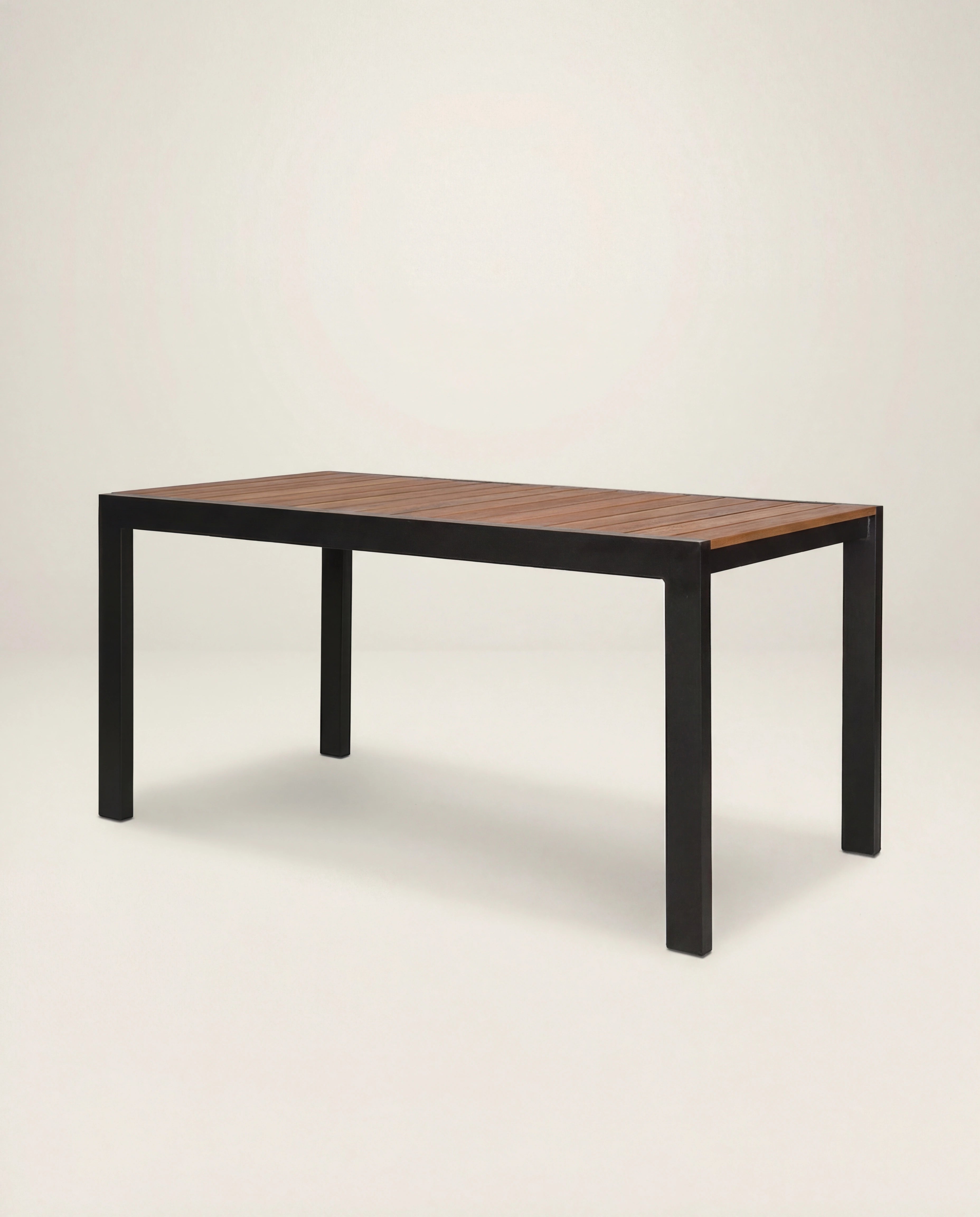Wooden table with black metal legs on a white background